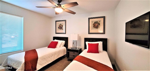 4617 E Emile Zola Ave, Phoenix, AZ 85032 - bedroom with dark carpet and a ceiling fan