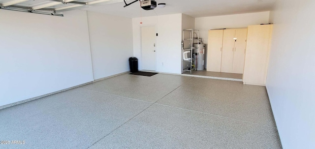4617 E Emile Zola Ave, Phoenix, AZ 85032 - garage featuring water heater and a garage door opener