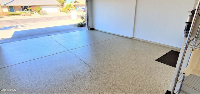 4617 E Emile Zola Ave, Phoenix, AZ 85032 - garage featuring baseboards