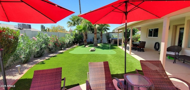 4617 E Emile Zola Ave, Phoenix, AZ 85032 - fenced backyard featuring a putting area, a patio area, and outdoor dining space