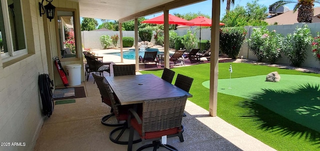 4617 E Emile Zola Ave, Phoenix, AZ 85032 - fenced backyard featuring a putting green, a patio area, and outdoor dining area