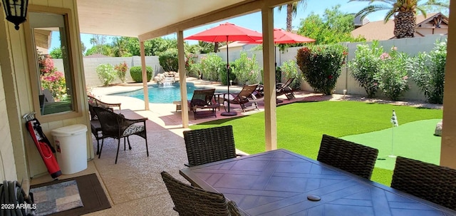 4617 E Emile Zola Ave, Phoenix, AZ 85032 - fenced backyard featuring an area to practice putting, a patio area, and outdoor dining area