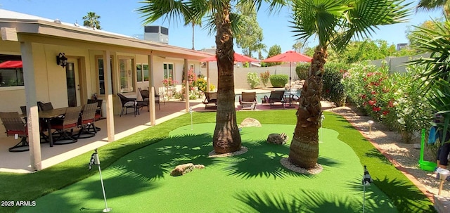 4617 E Emile Zola Ave, Phoenix, AZ 85032 - fenced backyard with a putting area and a patio area