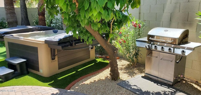 4617 E Emile Zola Ave, Phoenix, AZ 85032 - view of patio with grilling area and a hot tub