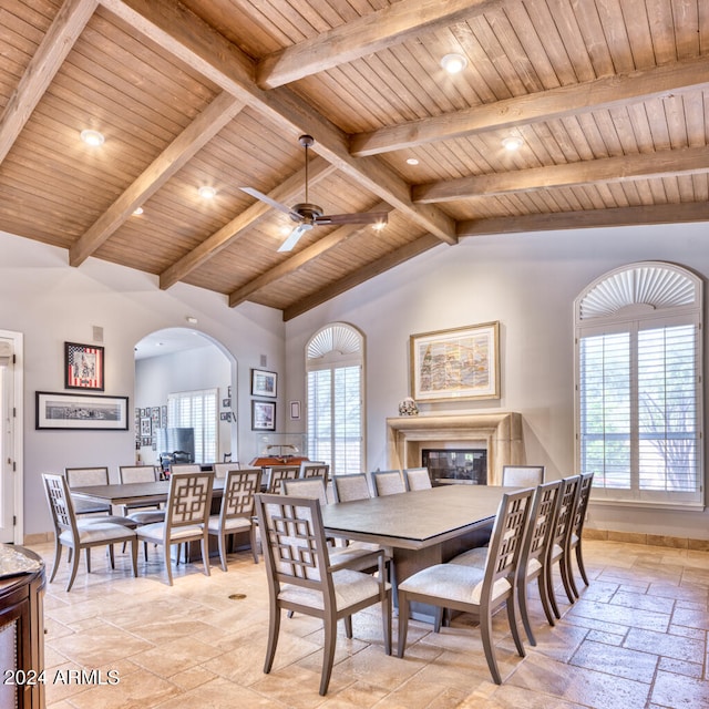 dining space featuring wooden ceiling, ceiling fan, and a wealth of natural light