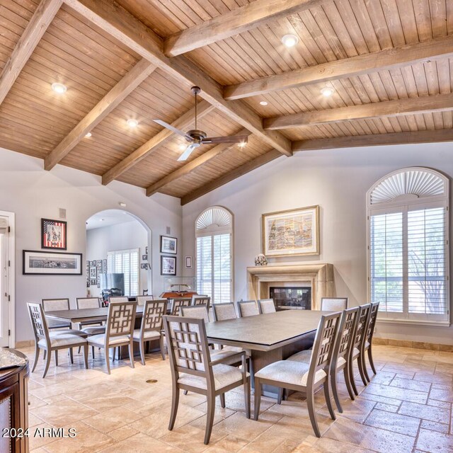 7101 E Berneil Ln, Paradise Valley, AZ 85253 - dining space with stone tile floors, arched walkways, wood ceiling, recessed lighting, and a ceiling fan