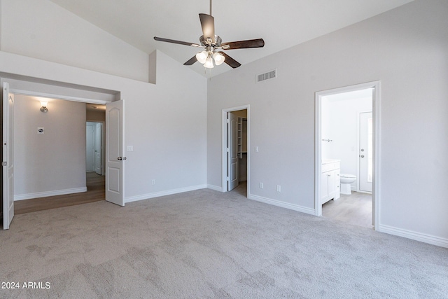 unfurnished bedroom featuring light carpet, visible vents, and baseboards