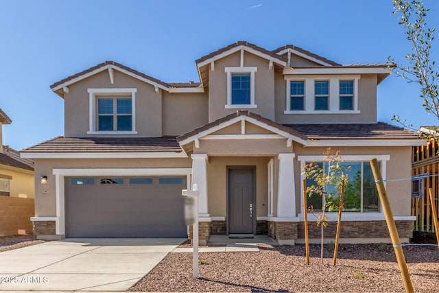 craftsman-style home with a garage