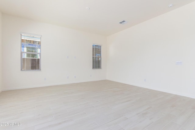 empty room featuring light hardwood / wood-style floors