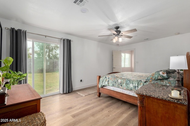 bedroom featuring a ceiling fan, baseboards, visible vents, access to exterior, and light wood finished floors