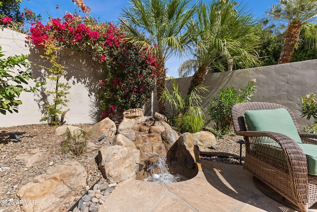 view of patio featuring a fenced backyard