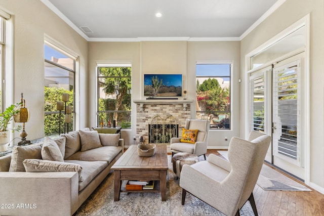 sunroom with a fireplace and visible vents