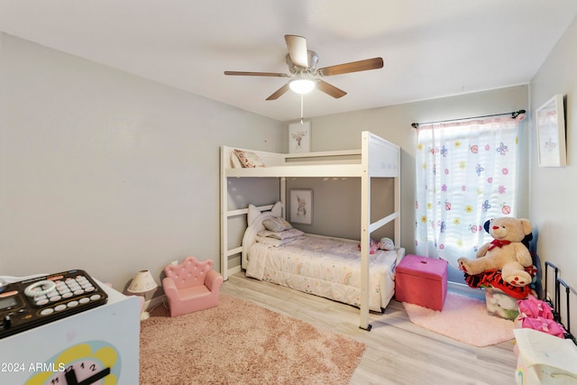 bedroom featuring light hardwood / wood-style floors and ceiling fan