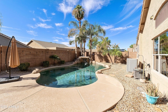 view of pool featuring a patio area and central AC