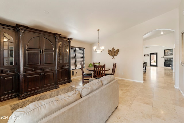 living room featuring a notable chandelier