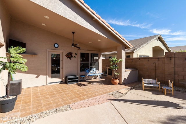 view of patio / terrace featuring ceiling fan