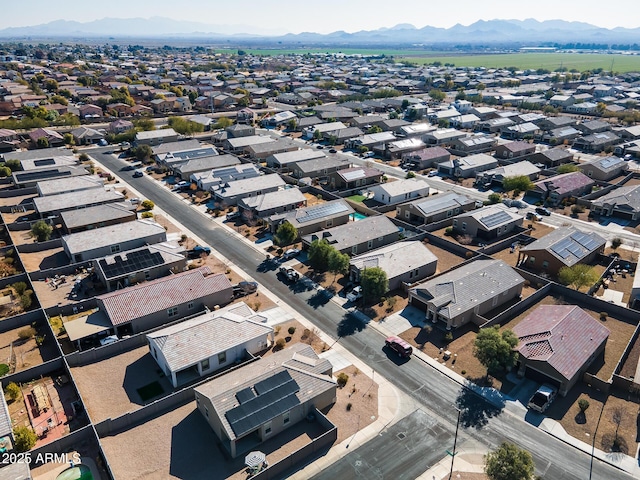 birds eye view of property featuring a mountain view