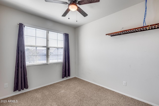 empty room with carpet floors and ceiling fan