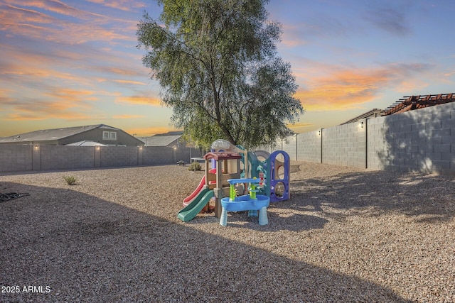 view of playground at dusk