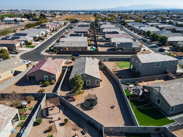 birds eye view of property featuring a mountain view