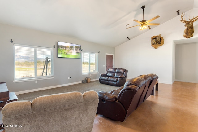 living room with ceiling fan and high vaulted ceiling