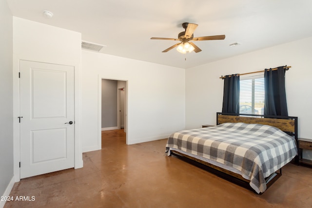 bedroom with concrete flooring and ceiling fan