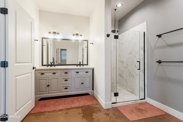 bathroom featuring an enclosed shower, vanity, and concrete floors