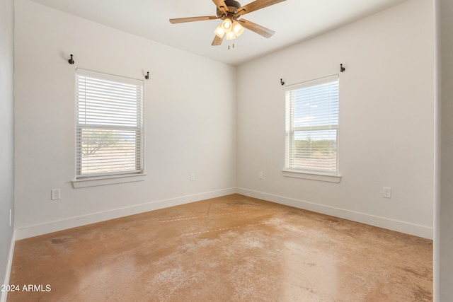 unfurnished room with ceiling fan