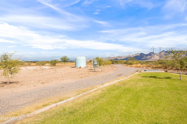 view of road featuring a mountain view and a rural view