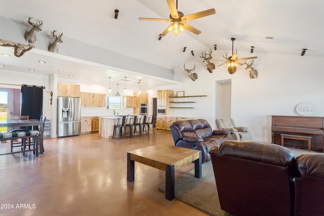 living room with high vaulted ceiling, a healthy amount of sunlight, and ceiling fan