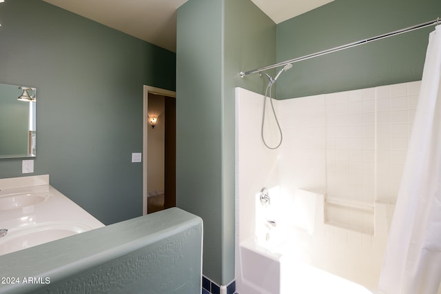 bathroom with vanity and shower / bath combination with curtain