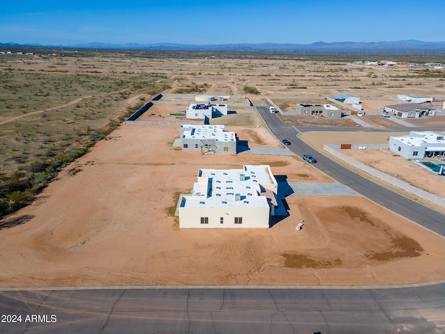 bird's eye view with view of desert, a mountain view, and a rural view