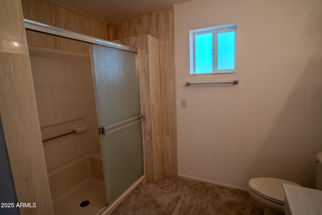 bathroom featuring an enclosed shower and toilet