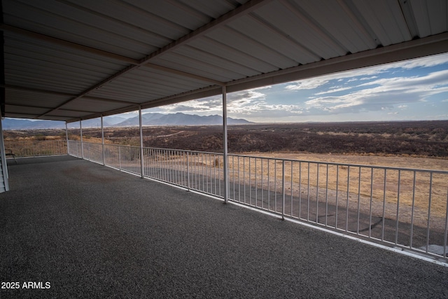 view of patio / terrace featuring a mountain view