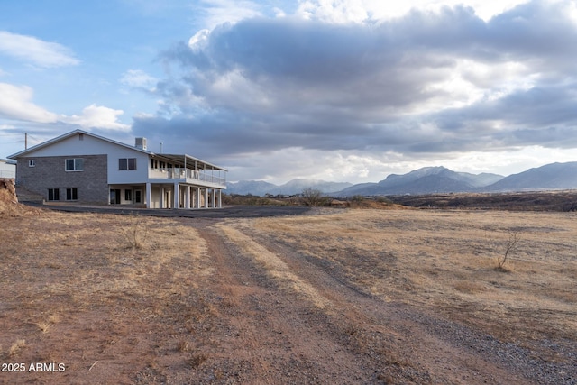 exterior space featuring a mountain view