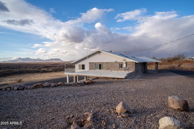 exterior space featuring a mountain view