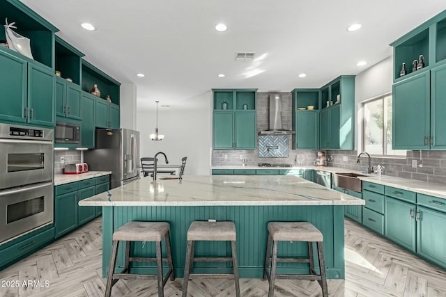 4497 E Carriage Way, Gilbert, AZ 85297 - kitchen with open shelves, wall chimney range hood, appliances with stainless steel finishes, a sink, and recessed lighting
