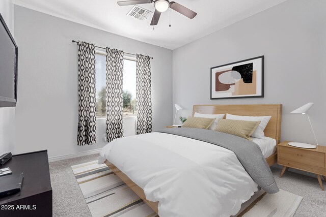 4497 E Carriage Way, Gilbert, AZ 85297 - carpeted bedroom with baseboards and a ceiling fan