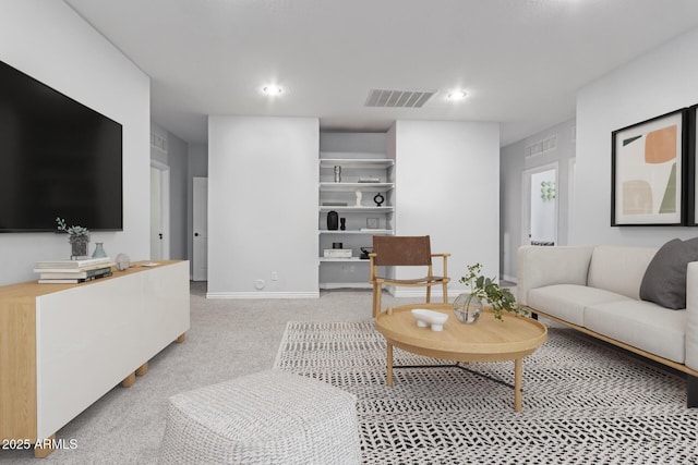 4497 E Carriage Way, Gilbert, AZ 85297 - living room with light colored carpet, recessed lighting, and baseboards