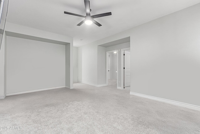 4497 E Carriage Way, Gilbert, AZ 85297 - empty room with ceiling fan, baseboards, and light colored carpet