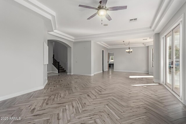 4497 E Carriage Way, Gilbert, AZ 85297 - empty room with arched walkways, ceiling fan, a chandelier, and baseboards