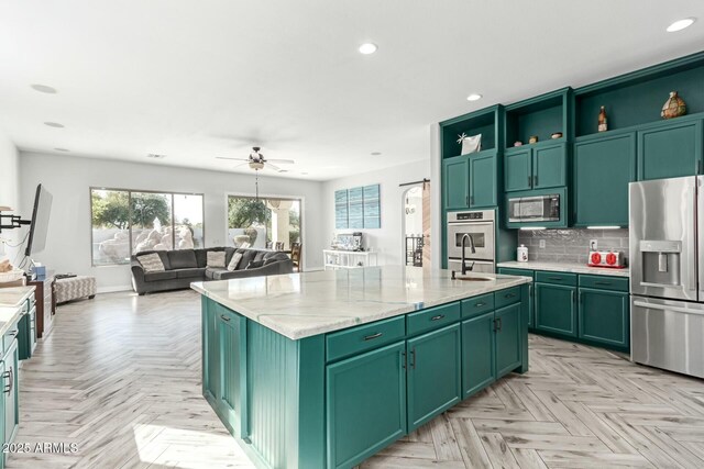 4497 E Carriage Way, Gilbert, AZ 85297 - kitchen with appliances with stainless steel finishes, green cabinets, ceiling fan, open shelves, and recessed lighting