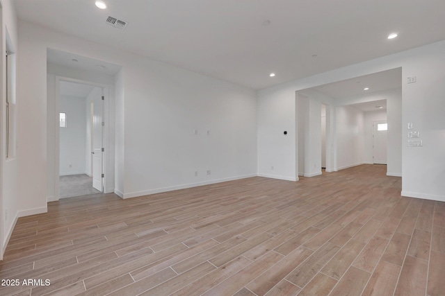 unfurnished room featuring light wood-type flooring