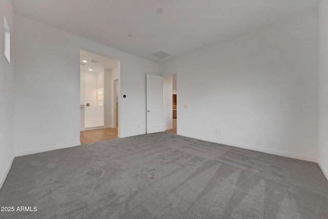 unfurnished bedroom featuring carpet