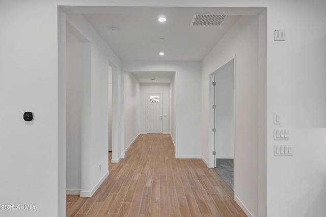 hallway featuring light hardwood / wood-style flooring