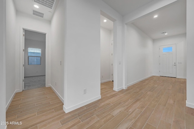 foyer entrance featuring light hardwood / wood-style flooring