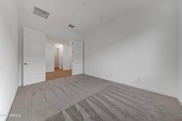 unfurnished bedroom featuring carpet flooring