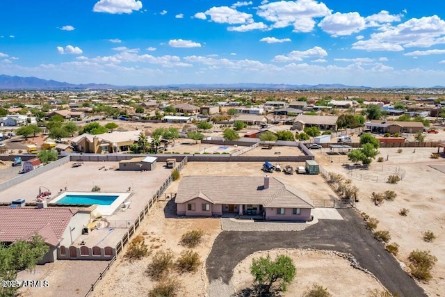 bird's eye view featuring a residential view and a mountain view