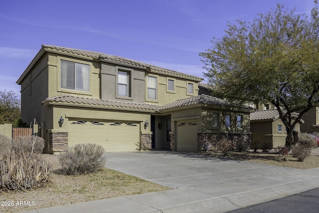 view of front of home with a garage