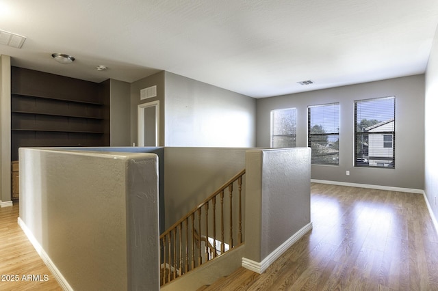 hall featuring wood-type flooring